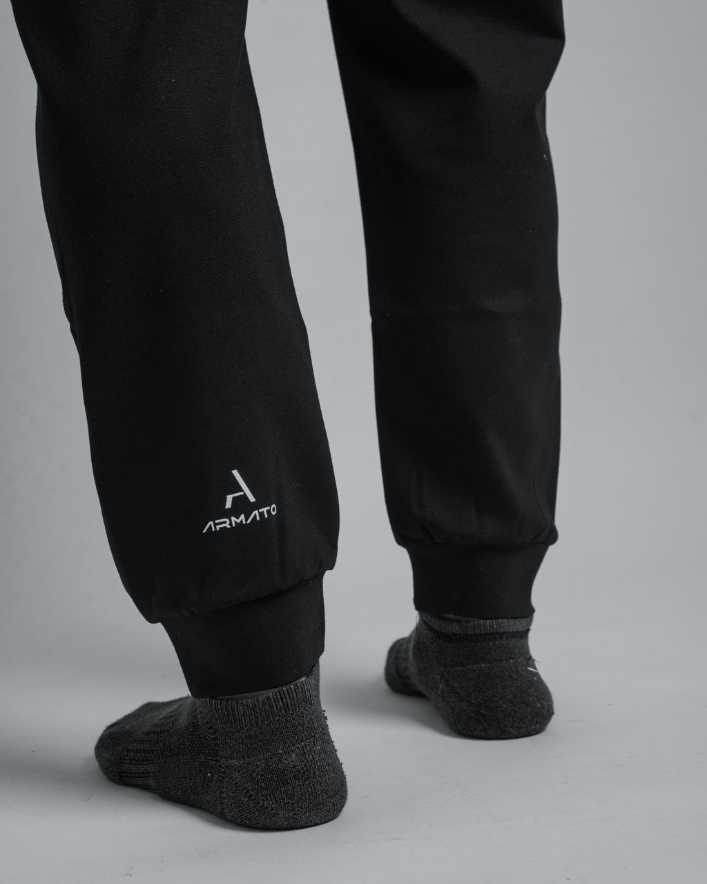 armato pants with the armato logo